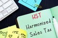 Harmonized Sales Tax Ã¢â¬â HST sign on the piece of paper